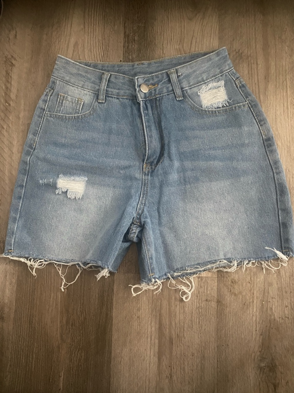 High-Rise Distressed Light Blue Denim Shorts